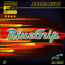 Donic BlueGrip C2 inverted table tennis paddle with blue rubber surface and wooden handle, used for competitive play.